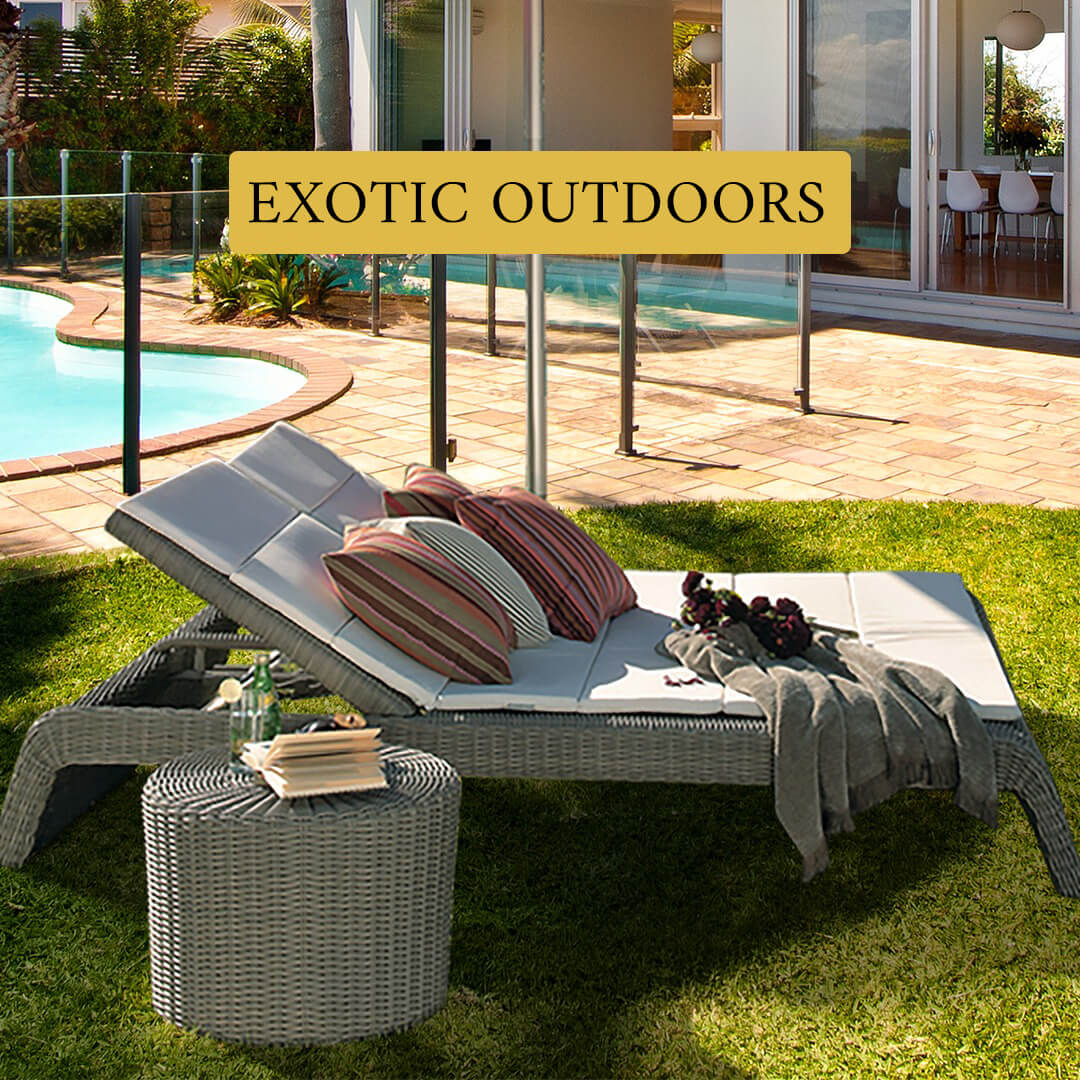 Loom Crafts Outdoor Garden Furniture A woman sits on an outdoor couch with cushions, holding a drink. The background features lush greenery. The text reads, "Sit, Relax, and Indulge in Luxury.