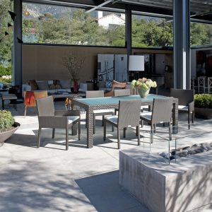 Loom Crafts Outdoor Garden Furniture A patio with a fire pit.