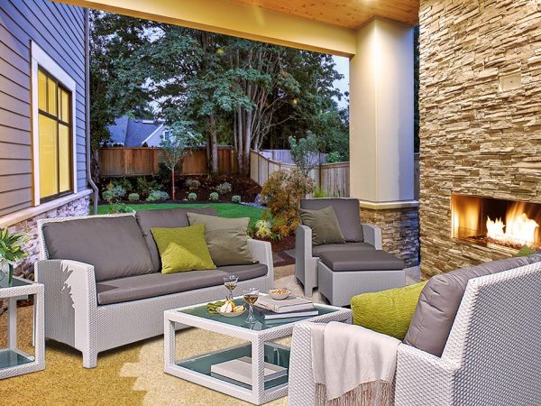 Loom Crafts Outdoor Garden Furniture A patio with furniture and a fire pit.