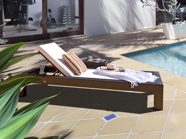 Loom Crafts Outdoor Garden Furniture A chaise lounge next to a swimming pool.