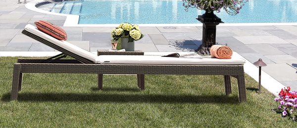 Loom Crafts Outdoor Garden Furniture A chaise lounge in front of a pool.