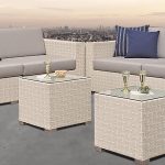 Loom Crafts Outdoor Garden Furniture A white wicker patio furniture set with blue cushions.