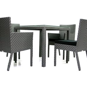 Loom Crafts Outdoor Garden Furniture A grey WICKER DINING ARMCHAIR WITH CUSHION (LCOD/141/001) set with four chairs and a table.