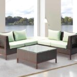 Loom Crafts Outdoor Garden Furniture A brown wicker CORNER SOFA MODULE WITH CUSHION (LCOL/189/001) patio furniture set with green cushions.
