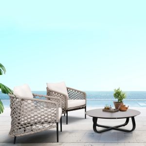 Loom Crafts Outdoor Garden Furniture A DINING ARMCHAIR LCO/086/001 with a view of the ocean.