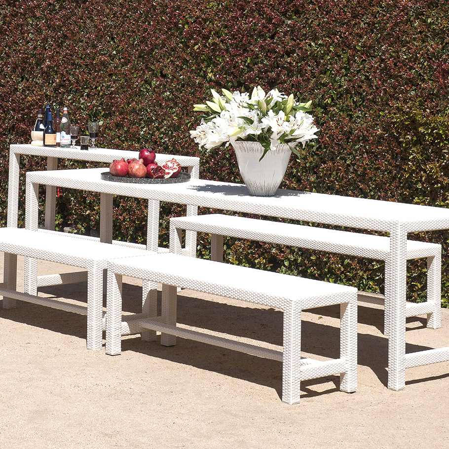 Loom Crafts Outdoor Garden Furniture A white outdoor table with two benches and flowers.